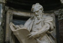 Matthew’s Marvelous Metanoia Rusconi statue of St Matthew holding a large tome