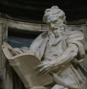 Matthew’s Marvelous Metanoia Rusconi statue of St Matthew holding a large tome