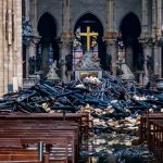 A view of the debris inside Notre-Dame de Paris in the aftermath of a fire that devastated the cathedral, during the visit of French Interior Minister Christophe Castaner, in Paris